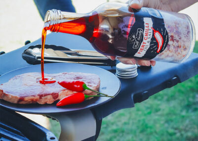 Fiery-Chilli-Oil-Salt-poured-on-bbq-meat