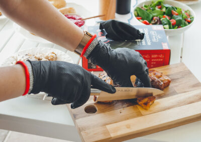 Wearing-Disposable-BBQ-Gloves